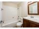 Clean bathroom with a shower-tub combo with tile surround and a single sink vanity at 3324 S Parkside Dr, Tempe, AZ 85282