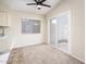 Breakfast nook with sliding glass door, ceiling fan, and lots of light at 3324 S Parkside Dr, Tempe, AZ 85282