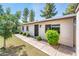 Well-maintained home exterior featuring a neat lawn and trimmed bushes at 3324 S Parkside Dr, Tempe, AZ 85282