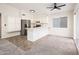 Bright kitchen boasts stainless steel appliances, ample counter space, and a breakfast bar at 3324 S Parkside Dr, Tempe, AZ 85282
