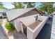 Aerial view of an exterior patio with a neutral wall, privacy fence and a metal gate at 3324 S Parkside Dr, Tempe, AZ 85282