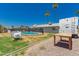 View of the backyard with a fenced pool at 3447 E Dolphin Ave, Mesa, AZ 85204