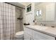 Bathroom features a single vanity with shower and tub combo at 3447 E Dolphin Ave, Mesa, AZ 85204
