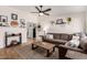 Comfortable living room featuring a plush sofa and stylish decor at 3447 E Dolphin Ave, Mesa, AZ 85204