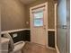 Cozy bathroom features tiled floors, shower and exterior access to a covered patio at 3740 E Mercer Ln, Phoenix, AZ 85028