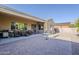 Large backyard with outdoor dining and lounge area, perfect for entertaining and relaxing at 3925 E Elmwood St, Mesa, AZ 85205