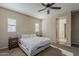 Comfortable bedroom with a queen-sized bed and windows at 3925 E Elmwood St, Mesa, AZ 85205