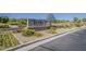 Elegant community entrance sign with beautiful landscaping and stone accents at 3925 E Elmwood St, Mesa, AZ 85205