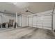 Spacious garage with multiple doors and ample space for parking and storage at 3925 E Elmwood St, Mesa, AZ 85205