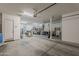 Large garage with high ceilings and plenty of storage space for vehicles and belongings at 3925 E Elmwood St, Mesa, AZ 85205