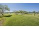 Community volleyball court surrounded by lush green lawns, providing an active space for community at 3925 E Elmwood St, Mesa, AZ 85205