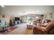 Spacious living room with plush seating, a large TV, and plenty of room for relaxation and entertainment at 3994 E Grand Canyon Pl, Chandler, AZ 85249