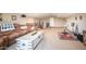 Comfortable living room featuring an expansive layout, plush seating, and flexible space for various activities at 3994 E Grand Canyon Pl, Chandler, AZ 85249