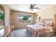 Bright main bedroom with queen bed, ceiling fan, and dresser with mirror at 3994 E Grand Canyon Pl, Chandler, AZ 85249