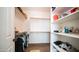 Organized walk-in closet with ample shelving, hanging rods, and organized storage for clothing and accessories at 3994 E Grand Canyon Pl, Chandler, AZ 85249