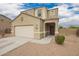 Beautiful two-story home featuring a neutral color palette, two-car garage, and covered front porch at 4061 N 308Th Ln, Buckeye, AZ 85396