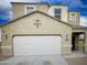 Charming two-story home featuring a two-car garage and stucco exterior with decorative accents at 4061 N 308Th Ln, Buckeye, AZ 85396