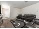 Spacious living room offering a neutral color palette, large carpet and an open floor plan at 4061 N 308Th Ln, Buckeye, AZ 85396