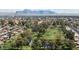 Expansive golf course aerial view, framed by trees and neighborhood homes at 4347 E Catalina Cir, Mesa, AZ 85206