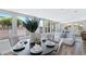 Open-concept dining area with views to the living room and backyard at 4347 E Catalina Cir, Mesa, AZ 85206