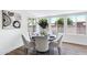 Bright dining room with large windows and modern decor at 4347 E Catalina Cir, Mesa, AZ 85206