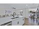 Bright and airy kitchen with stainless steel appliances and breakfast bar seating at 4347 E Catalina Cir, Mesa, AZ 85206