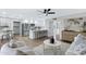 Open concept living room and kitchen with modern furniture and lots of natural light at 4347 E Catalina Cir, Mesa, AZ 85206