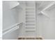 Organized walk-in closet featuring custom shelving and ample storage space at 4347 E Catalina Cir, Mesa, AZ 85206