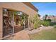 Charming front entrance with wrought iron gate, desert landscaping, and mountain views at 4518 E Solano Dr, Phoenix, AZ 85018