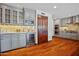 Gourmet kitchen featuring stainless steel appliances, wine cooler, and plenty of counter space at 4518 E Solano Dr, Phoenix, AZ 85018