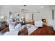 Comfortable living room with a decorative light fixture, fireplace, and ample seating at 4518 E Solano Dr, Phoenix, AZ 85018