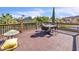 Enjoy outdoor relaxation on this spacious deck with a table and seating, great for entertainment at 4547 E Buist Ave, Phoenix, AZ 85044