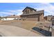 Beautiful two-story home with mature landscaping, driveway, and sidewalk at 4547 E Buist Ave, Phoenix, AZ 85044