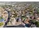 Aerial view of a residential neighborhood featuring beautiful homes, mature trees, and well-maintained streets at 4547 E Buist Ave, Phoenix, AZ 85044