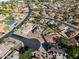 Aerial view of a lush residential neighborhood showcasing well-maintained homes, mature landscaping, and inviting streets at 4547 E Buist Ave, Phoenix, AZ 85044