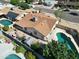Aerial view of backyard featuring a pool, patio, shed, and partial view of neighborhood at 4623 W Solano S Dr # South, Glendale, AZ 85301