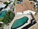 Aerial view showcases the backyard's inground pool and covered patio, perfect for outdoor living and entertaining at 4623 W Solano S Dr # South, Glendale, AZ 85301
