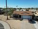 Exterior of home with two-car garage and desert landscaping from street view in established Phoenix neighborhood at 4623 W Solano S Dr # South, Glendale, AZ 85301