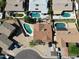 Aerial view displays a neighborhood with numerous pools and well-maintained homes and landscaping at 4623 W Solano S Dr # South, Glendale, AZ 85301