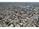Wide aerial view showcases a well-established neighborhood with mature trees, pools, and various home styles at 4623 W Solano S Dr # South, Glendale, AZ 85301