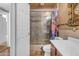 Bathroom view with a vanity, toilet, shower and ornate gilded mirror at 4632 W Marlette Ave, Glendale, AZ 85301