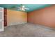 Bedroom with aqua trim has ceiling fan and closet space at 4632 W Marlette Ave, Glendale, AZ 85301