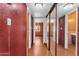 Hallway featuring closet mirror doors leads to different rooms at 4632 W Marlette Ave, Glendale, AZ 85301