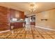 Wide shot of eat-in kitchen with updated cabinets and granite countertops at 4632 W Marlette Ave, Glendale, AZ 85301