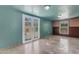 Bright living room features tiled flooring and French doors leading to the yard at 4632 W Marlette Ave, Glendale, AZ 85301
