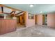 Open living space features decorative tile flooring, fireplace, and arched entryways at 4632 W Marlette Ave, Glendale, AZ 85301