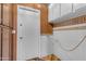 A utilitarian mud room showcasing functional storage and vintage tiled walls at 4632 W Marlette Ave, Glendale, AZ 85301