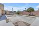 Backyard featuring an empty in-ground pool needing renovation and desert landscaping at 4632 W Marlette Ave, Glendale, AZ 85301