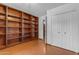 Room features a built-in bookcase and a closet doorway at 4632 W Marlette Ave, Glendale, AZ 85301