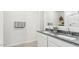 Bathroom with granite countertops, double sinks, and chrome faucet fixtures at 48388 N Duran Way, Gold Canyon, AZ 85118